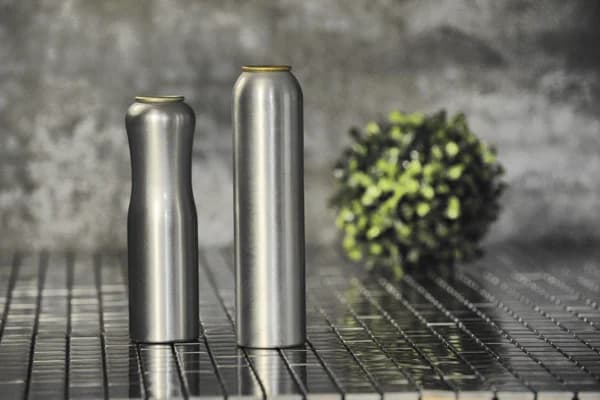 Manufacturers of aluminum tubes and aerosol cans face market adjustments and regulatory changes