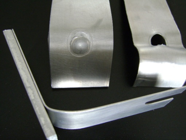 A 0.6 mm thick 6061-T6 sheet FMRWTM welded