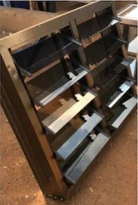 Iddrisu Kande, a woman running Marouf Aluminum Fabrications