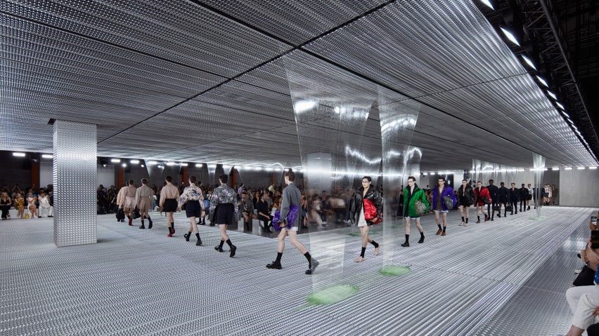 Prada's Spring Summer show bolsters AMO’s fluid architecture featuring aluminium ceiling with slim drools