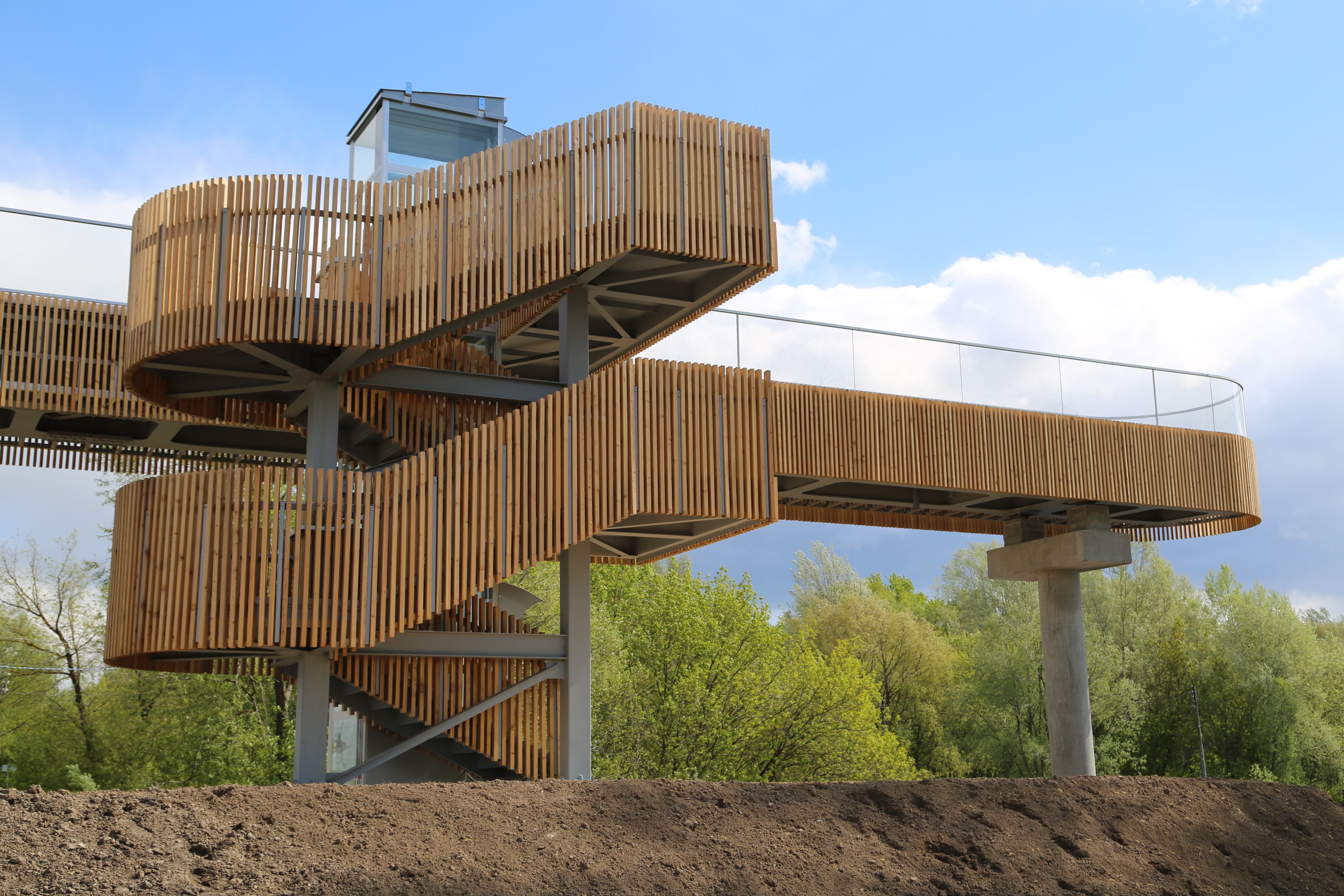 Pedestrian Bridge in the Town of Bor, Nizhny Novgorod Region or Cable-Stayed Aluminium Pedestrian Bridge in Krasnoyarsk