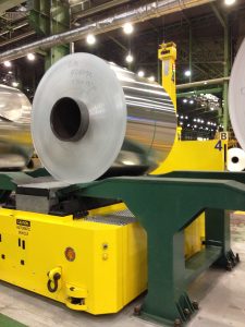 60000 pound aluminum coil being loaded onto a lightweight AGV